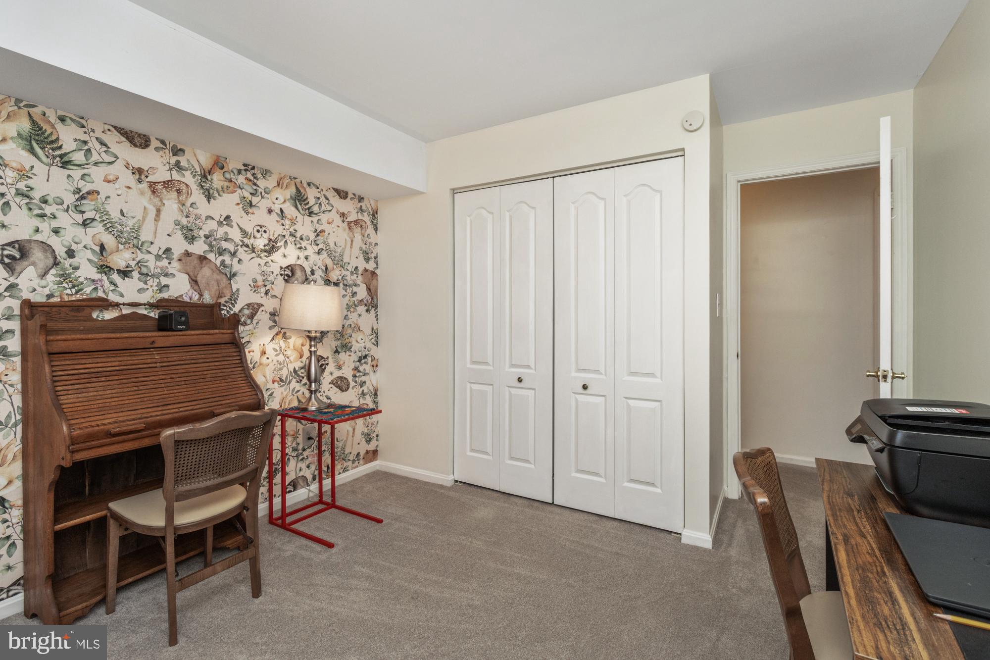 8489 Falls Run Road, Unit B Ellicott City, MD 21043 - Photo 27 of 41 a view of a livingroom with furniture and staircase