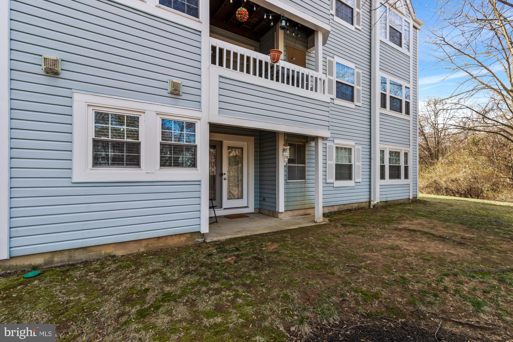 8489 Falls Run Road, Unit B Ellicott City, MD 21043 - Photo 30 of 41 a view of a house with a window
