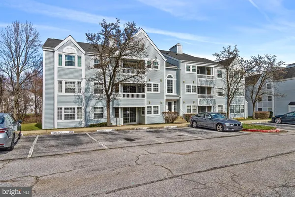a front view of a building with street view