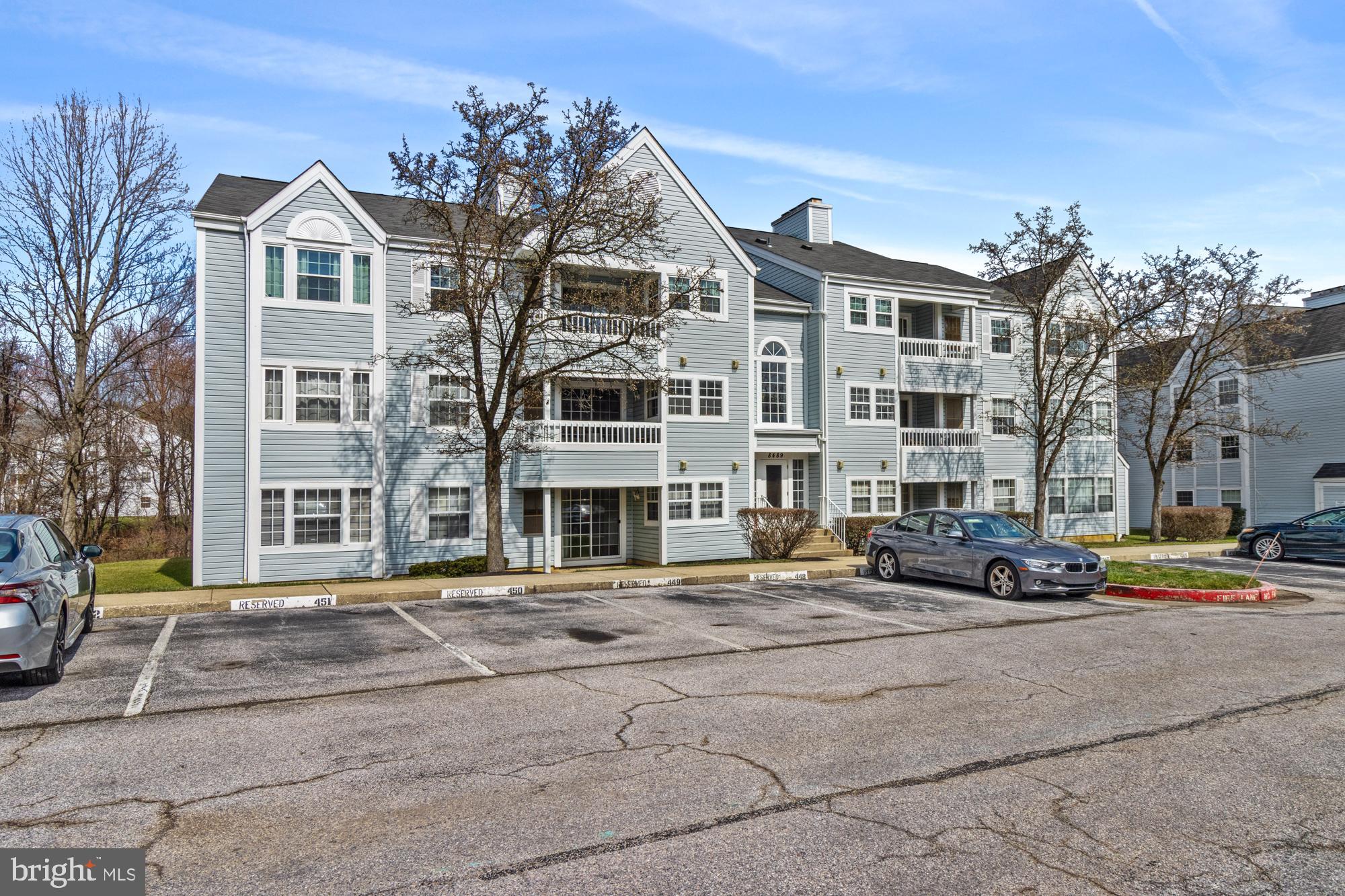 8489 Falls Run Road, Unit B Ellicott City, MD 21043 - Photo 3 of 41 a front view of a building with street view