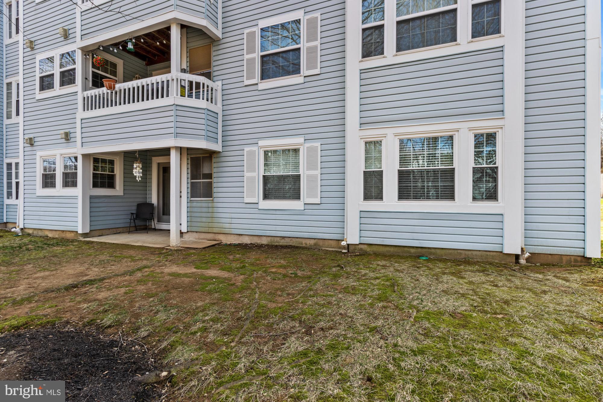 8489 Falls Run Road, Unit B Ellicott City, MD 21043 - Photo 31 of 41 a house view with a garden space
