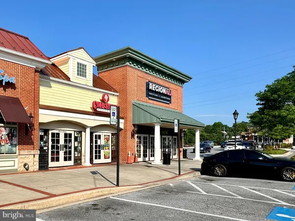 a view of a building with a street