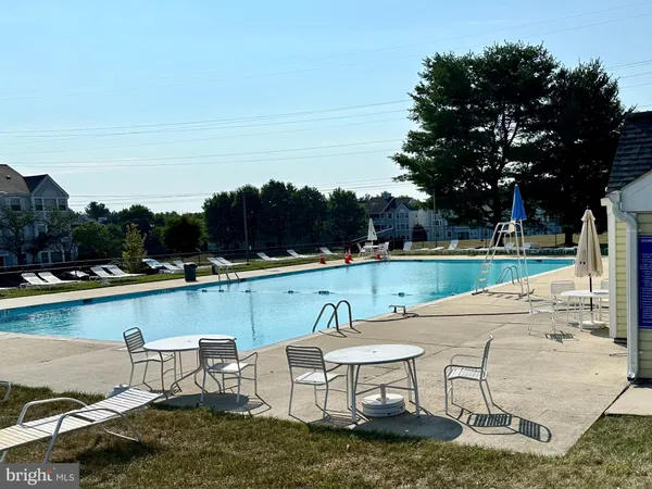 a garden view with a seating space