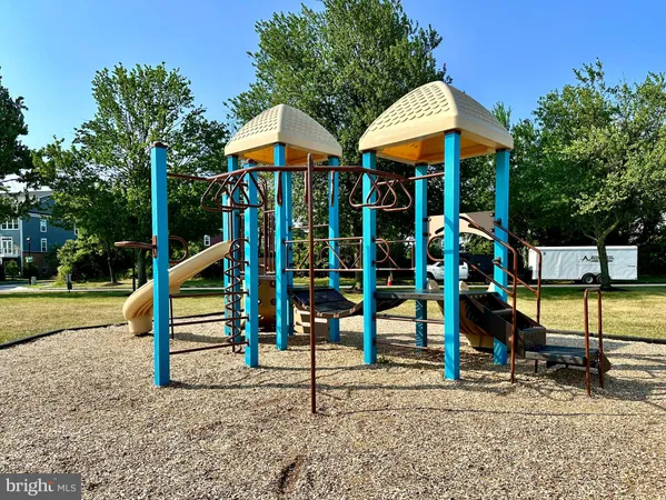 a view of a swimming pool with an outdoor space