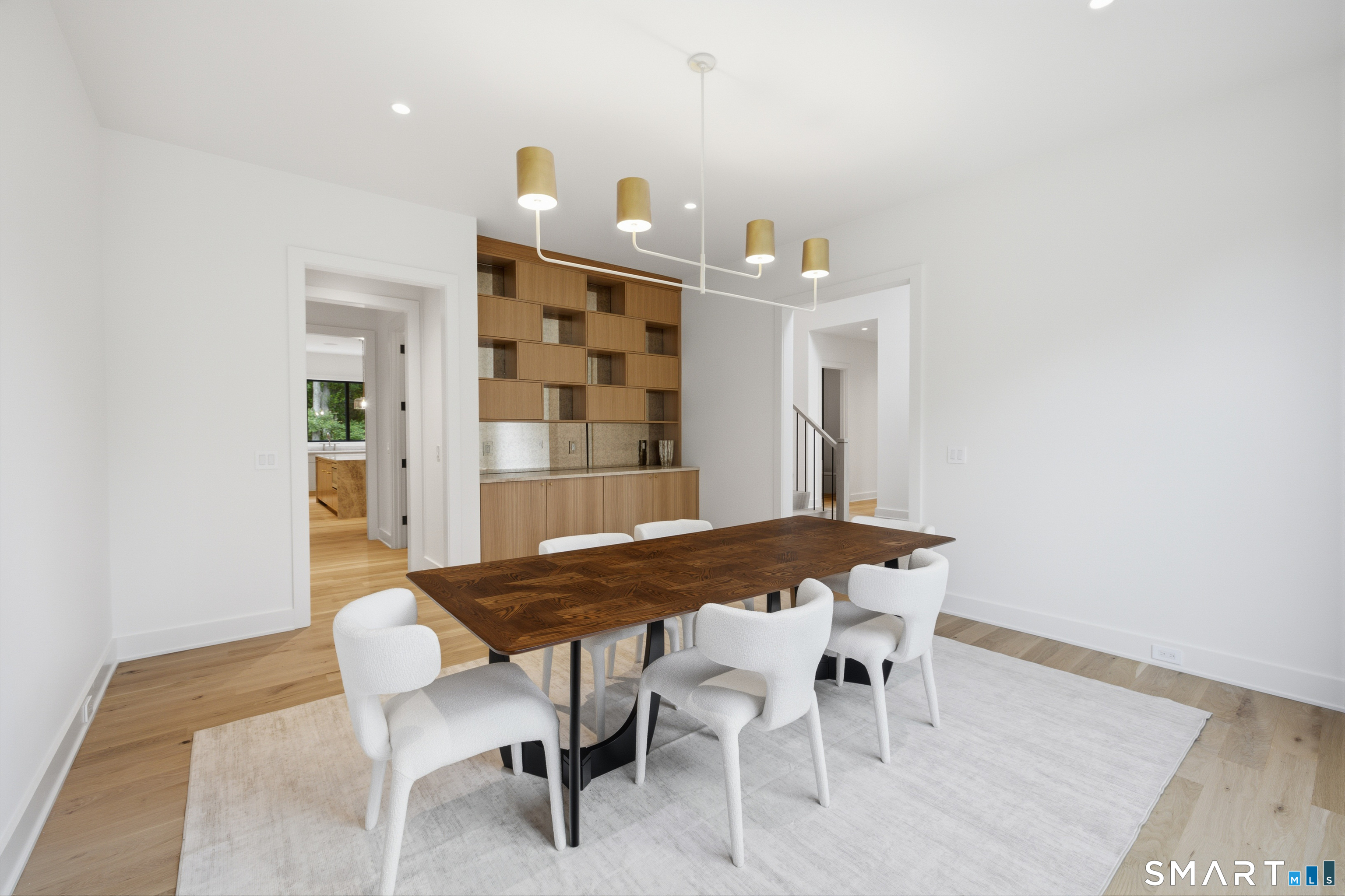 2 Windy Hill Road Westport, CT 06880 - Photo 14 of 40 a view of a dining room with furniture and wooden floor