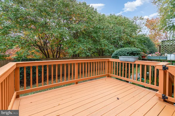 a front view of a house with a fence