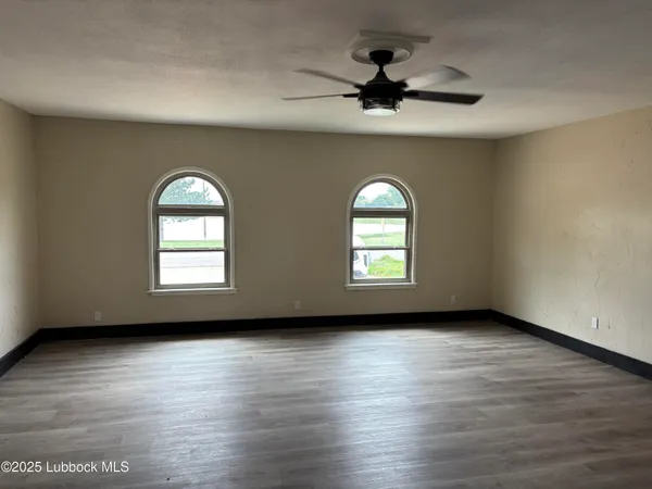 a kitchen with a sink and a refrigerator