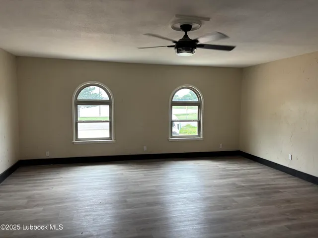 a kitchen with a sink and a refrigerator