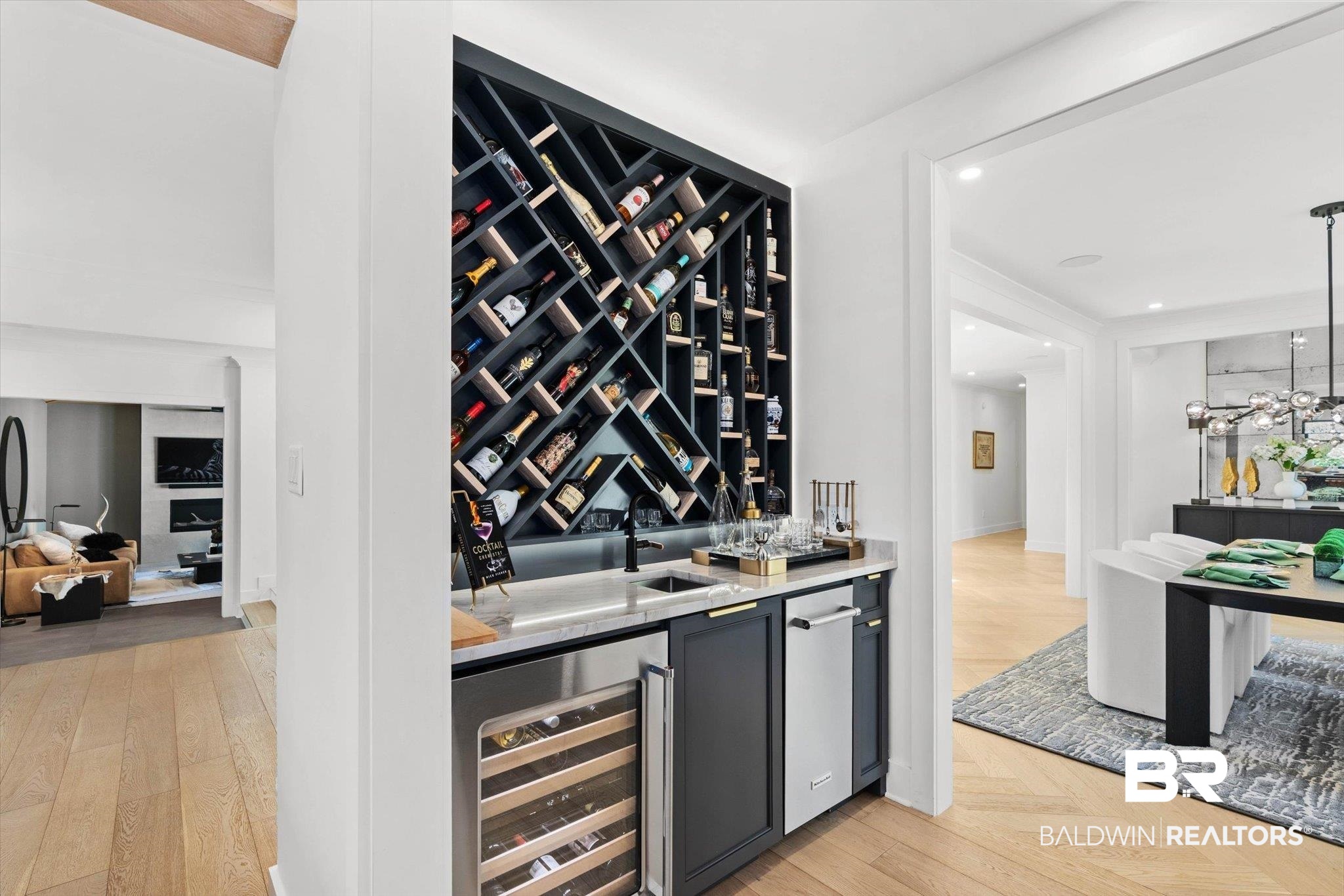 69 Jordan Lane Mobile, AL 36608 - Photo 10 of 57 Wine cellar featuring wine cooler, parquet flooring, recessed lighting, and wet bar