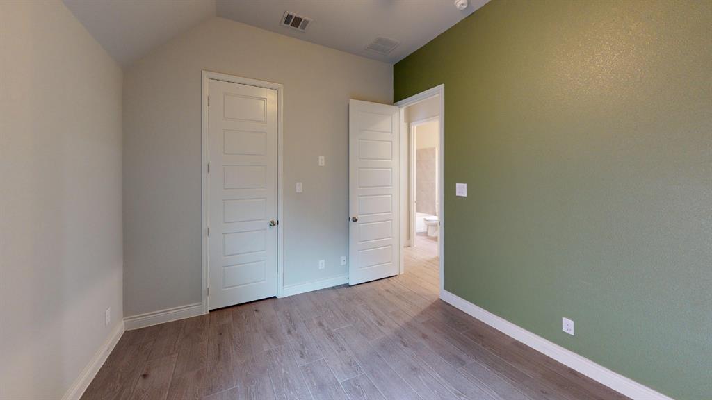 1516 Twistleaf Road Flower Mound, TX 76226 - Photo 12 of 22 an empty room with wooden floor