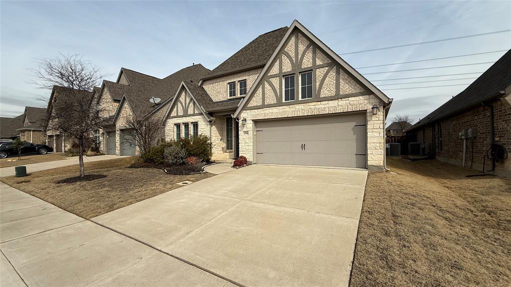 1516 Twistleaf Road Flower Mound, TX 76226 - Photo 2 of 22 a front view of a house with a yard
