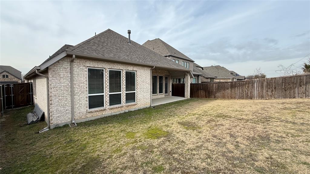 1516 Twistleaf Road Flower Mound, TX 76226 - Photo 21 of 22 a front view of a house with a yard