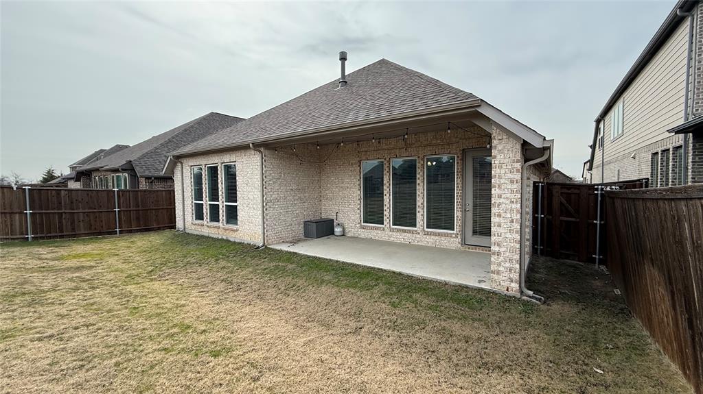1516 Twistleaf Road Flower Mound, TX 76226 - Photo 22 of 22 a front view of a house with a yard
