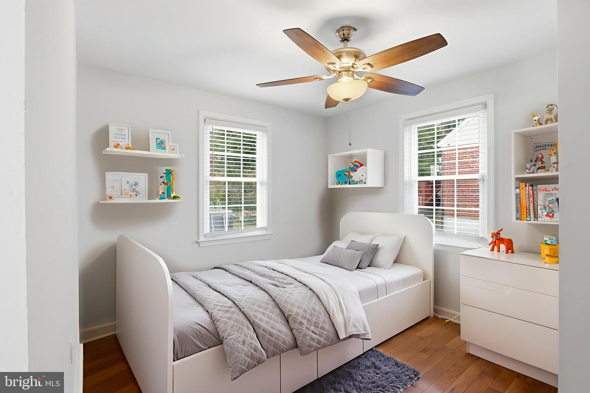 3497 Hillsmere Road Gwynn Oak, MD 21207 - Photo 20 of 45 a bedroom with a bed and a large window