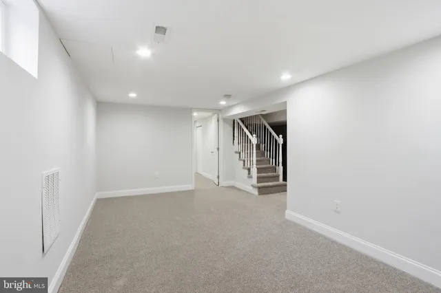 a view of hallway with stairs