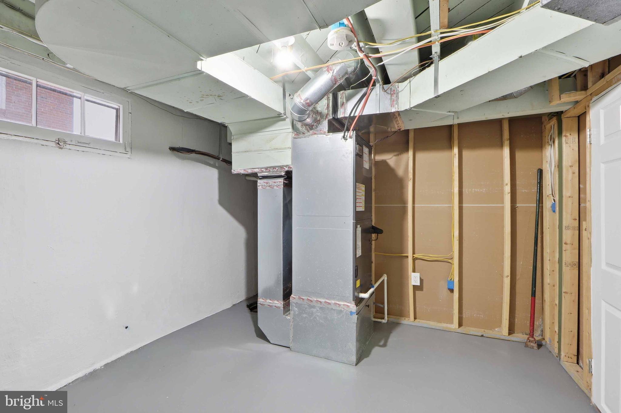 3497 Hillsmere Road Gwynn Oak, MD 21207 - Photo 37 of 45 a view of a room with rack on the wall