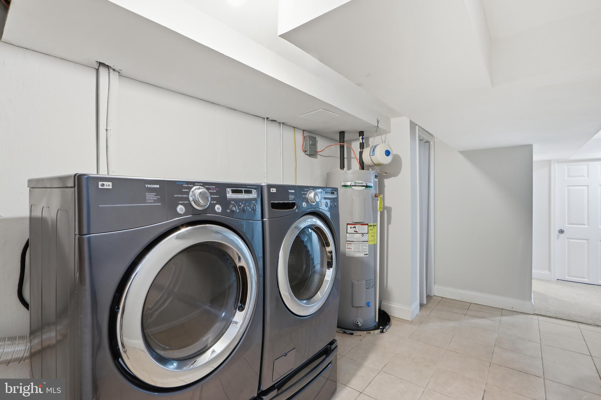 3497 Hillsmere Road Gwynn Oak, MD 21207 - Photo 41 of 45 a utility room with dryer and washer