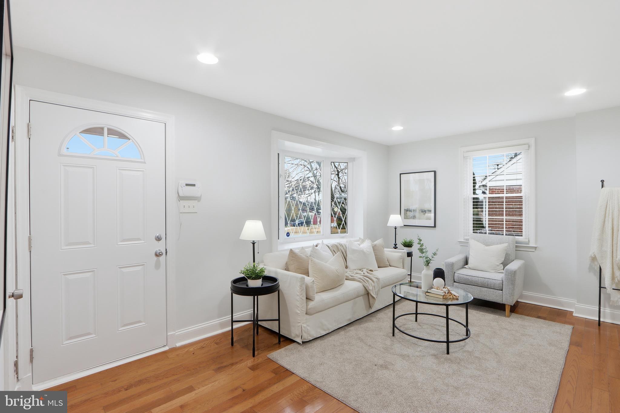 3497 Hillsmere Road Gwynn Oak, MD 21207 - Photo 6 of 45 a living room with furniture and a window