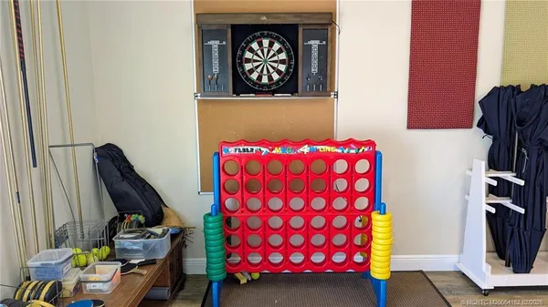 a view of a bedroom with bed and furniture
