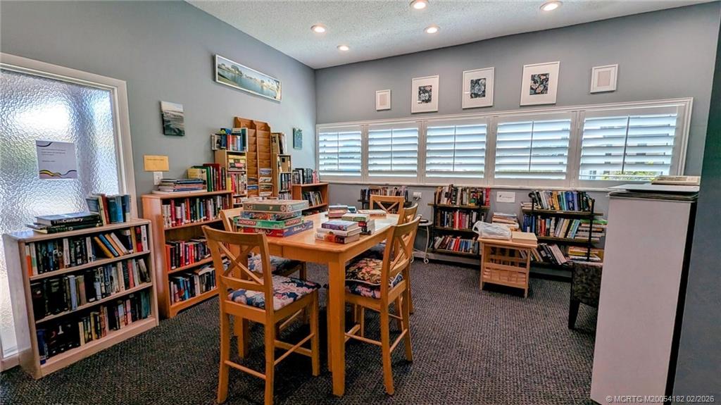 6531 Southeast Federal Highway, Unit A109 Stuart, FL 34997 - Photo 17 of 21 a very nice looking dining room with a table and chairs in it