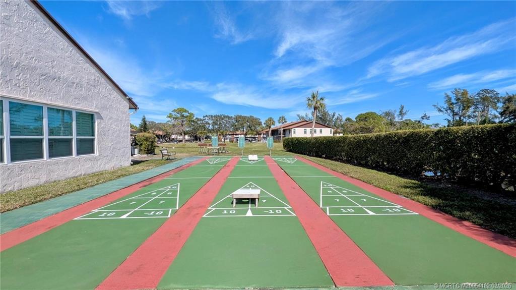 6531 Southeast Federal Highway, Unit A109 Stuart, FL 34997 - Photo 19 of 21 a view of an outdoor space pool patio and outdoor seating