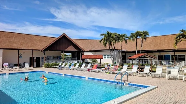 a outdoor space with lots of palm trees