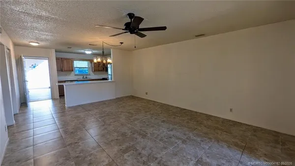 a view of a kitchen with a sink