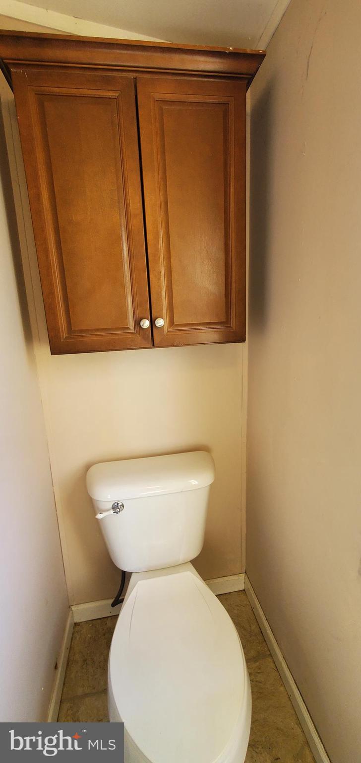 123 Wood Road Aberdeen, MD 21001 - Photo 21 of 23 a close view of a toilet in a bathroom