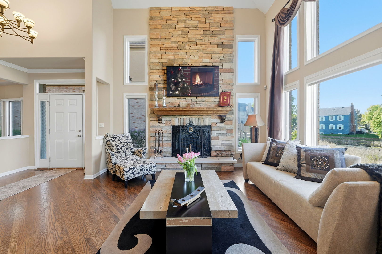 1406 Rue Paris Place Inverness, IL 60067 - Photo 5 of 35 a living room with furniture and a fireplace