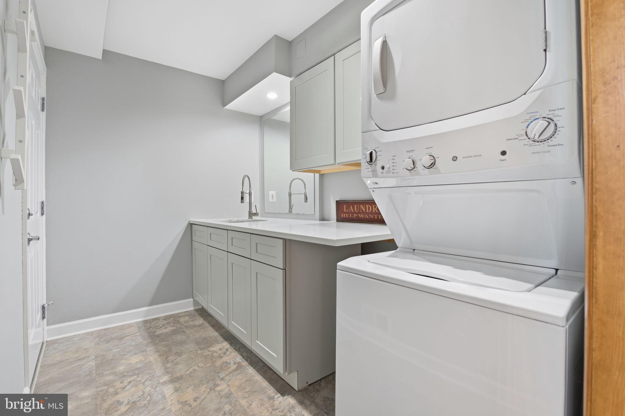 260 Grays Road Lothian, MD 20711 - Photo 36 of 48 Modern laundry space with sleek design.