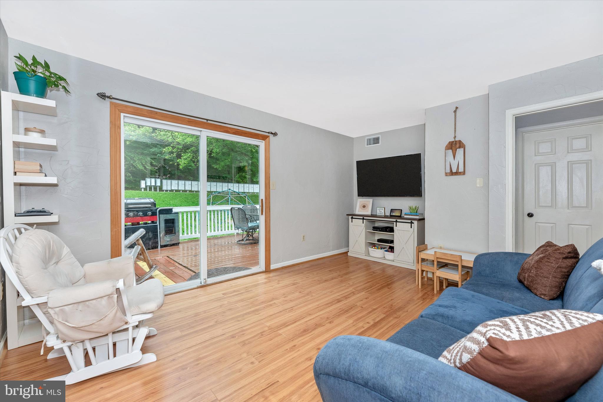 6567 Edgewood Road New Market, MD 21774 - Photo 14 of 60 Family room with sliding door to the deck
