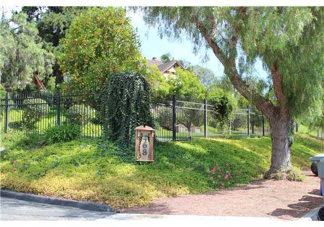 468 Rudd Road Vista, CA 92084 - Photo 10 of 21 Black Iron Fench surrounds front of propety