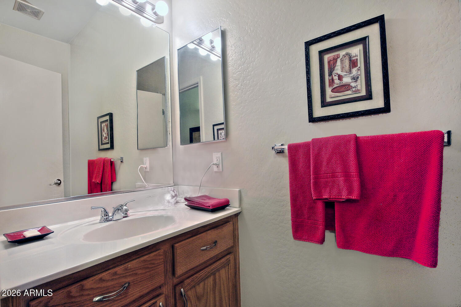 2150 East Bell Road, Unit 1069 Phoenix, AZ 85022 - Photo 13 of 33 a bathroom with a granite countertop tub and a sink
