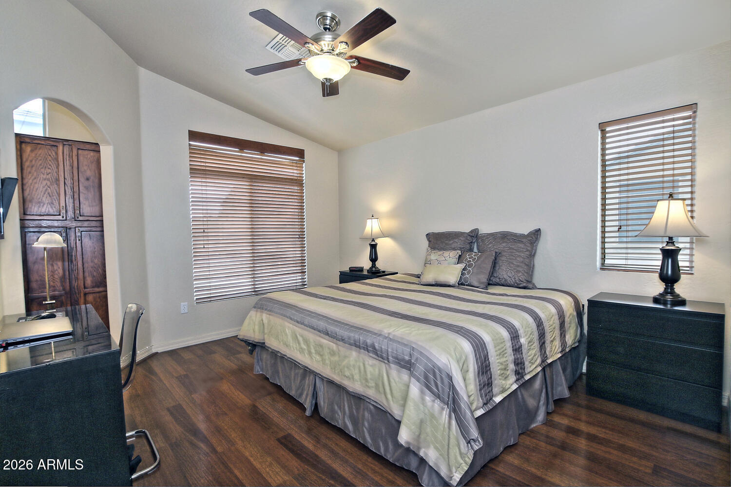 2150 East Bell Road, Unit 1069 Phoenix, AZ 85022 - Photo 19 of 33 a bedroom with bed and window