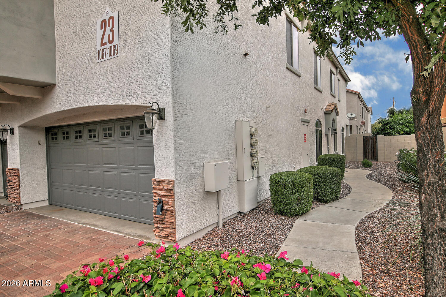 2150 East Bell Road, Unit 1069 Phoenix, AZ 85022 - Photo 2 of 33 a front view of a house