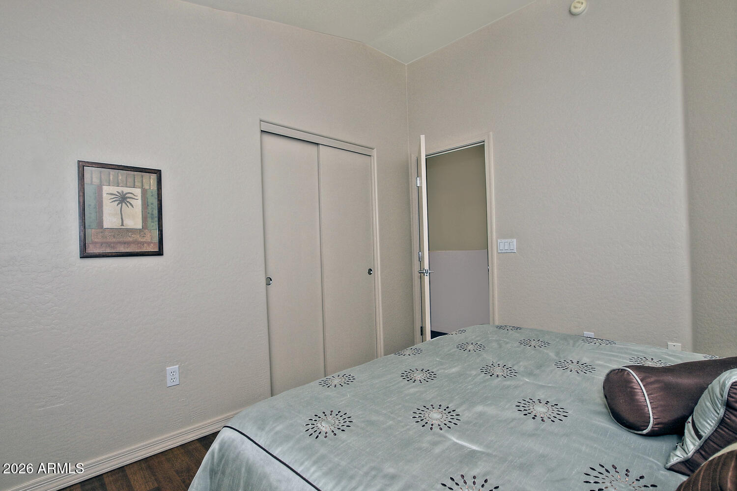 2150 East Bell Road, Unit 1069 Phoenix, AZ 85022 - Photo 28 of 33 a bedroom with a bed and hallway