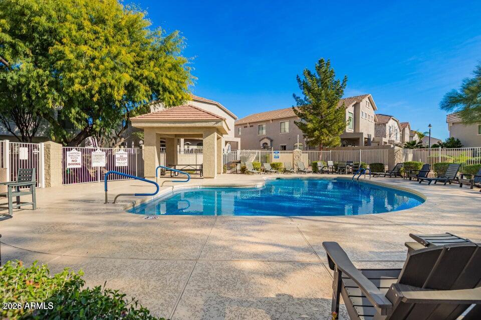 2150 East Bell Road, Unit 1069 Phoenix, AZ 85022 - Photo 6 of 33 a house view with a outdoor space