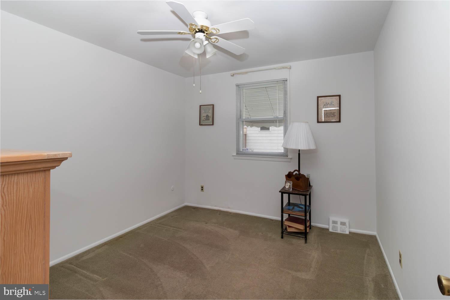 418 Densmore Road Philadelphia, PA 19116 - Photo 12 of 25 an empty room with windows and fan