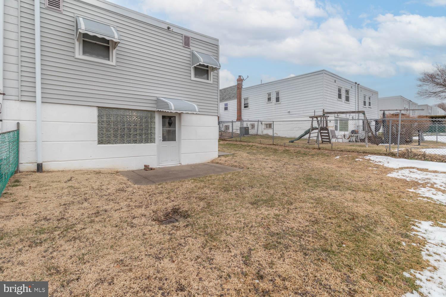418 Densmore Road Philadelphia, PA 19116 - Photo 25 of 25 a front view of a house with a yard