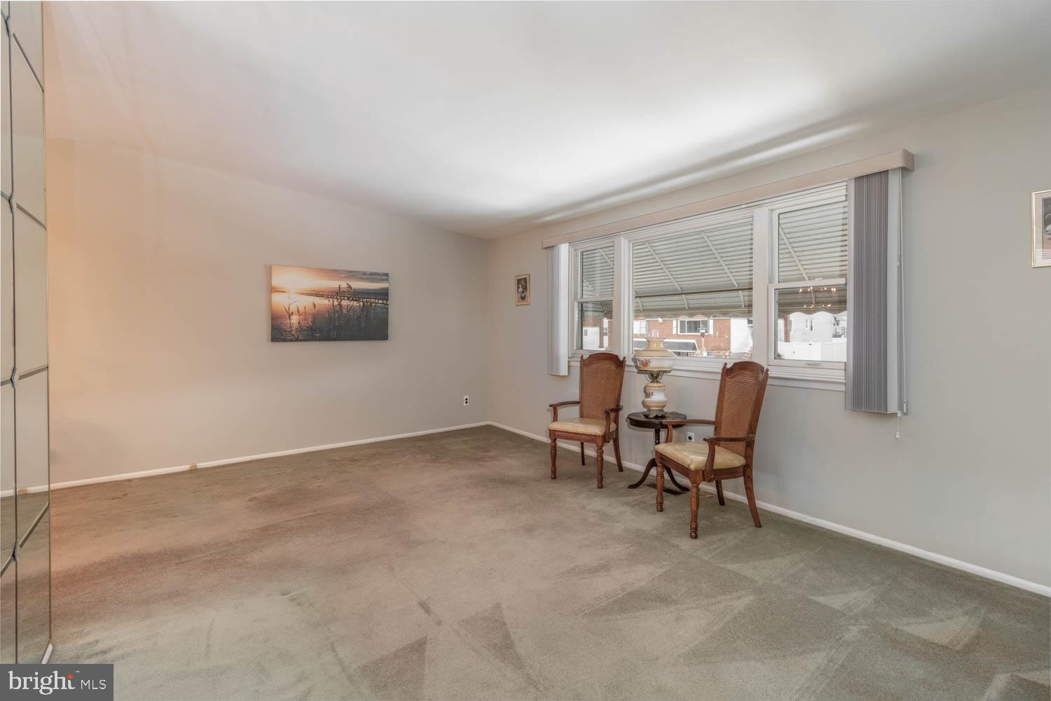 418 Densmore Road Philadelphia, PA 19116 - Photo 6 of 25 a view of a livingroom with furniture and a window