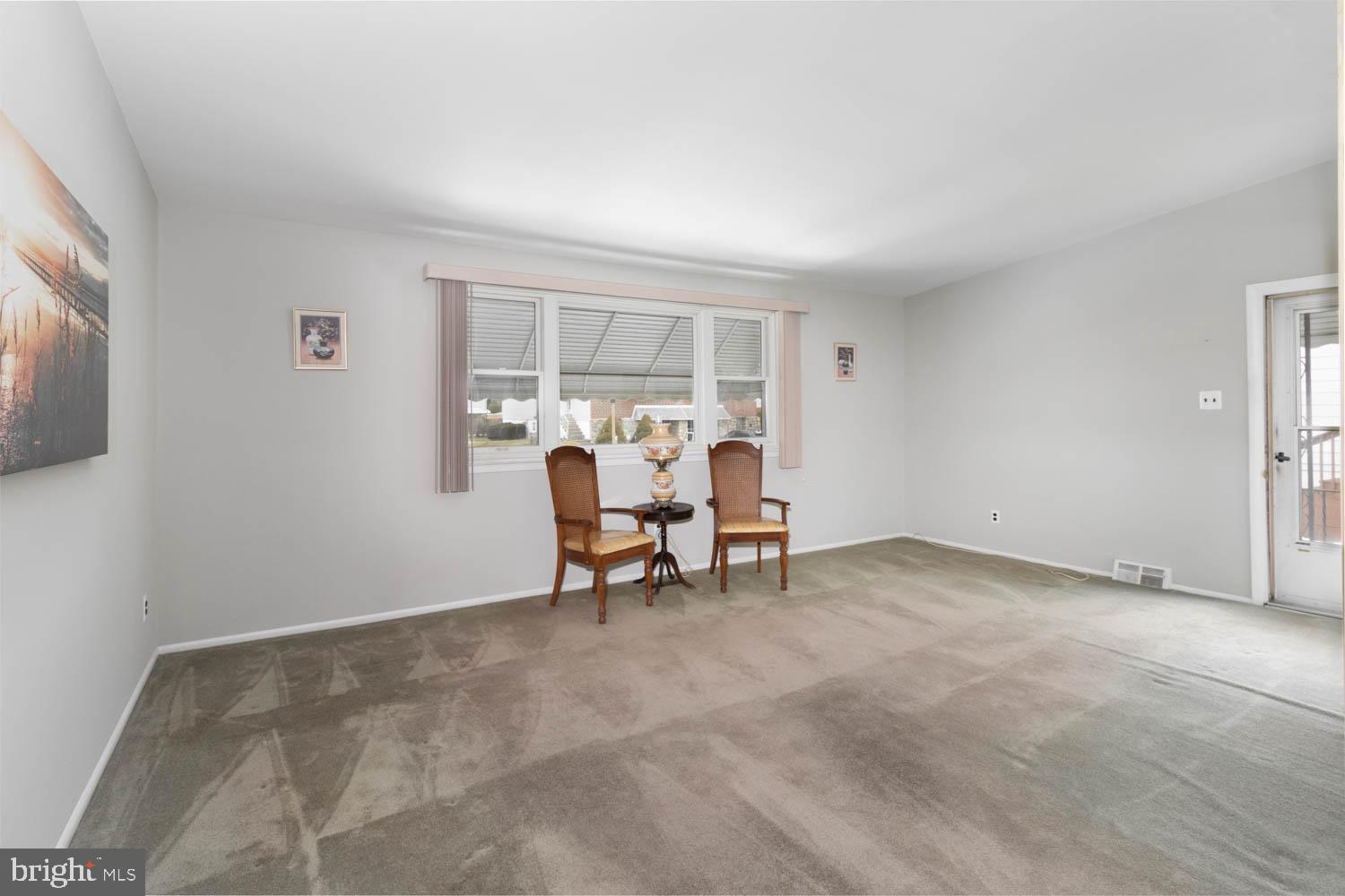 418 Densmore Road Philadelphia, PA 19116 - Photo 8 of 25 a view of a livingroom with table and chair