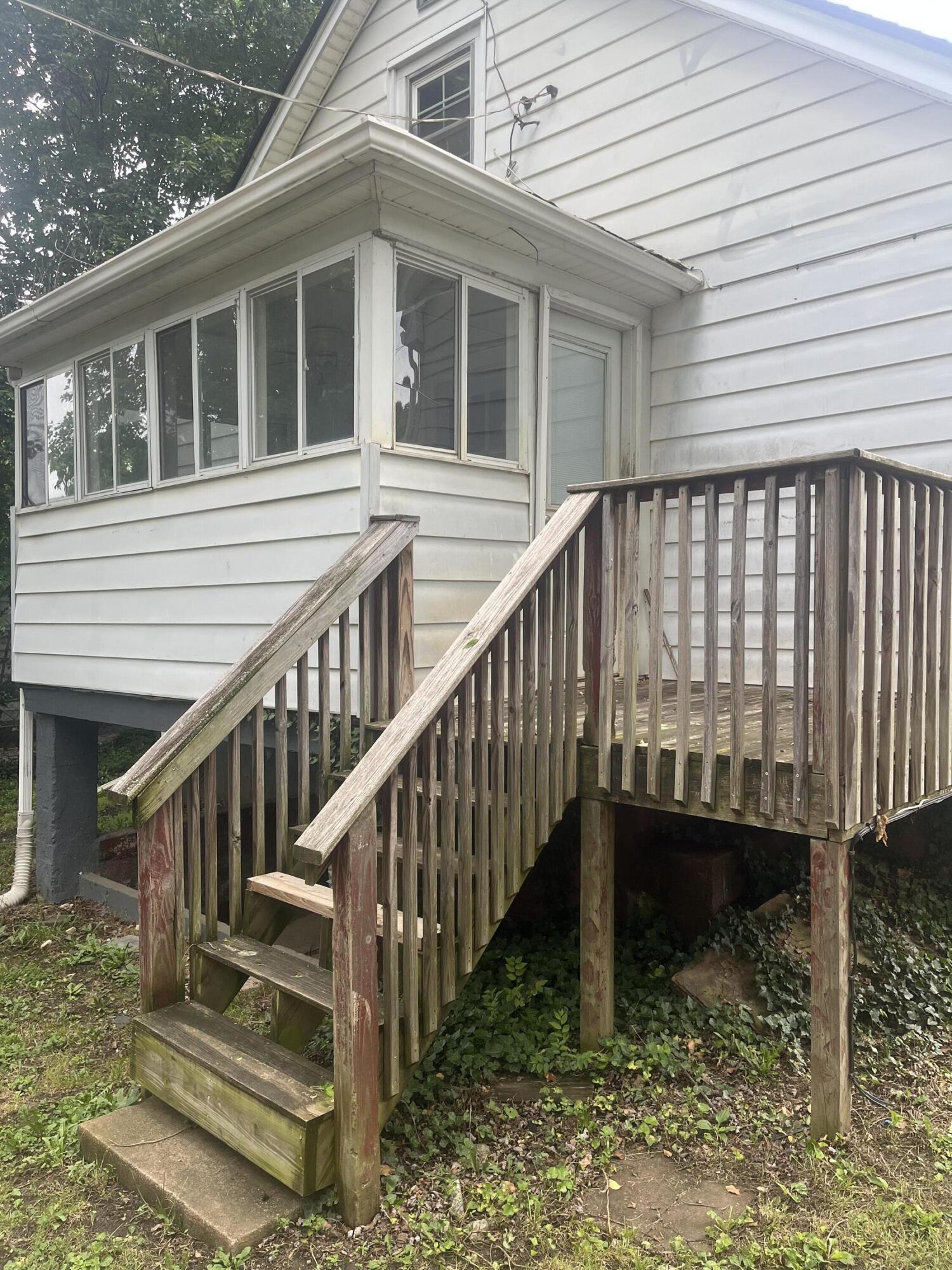 1815 Riverdale Road Southeast Roanoke, VA 24014 - Photo 3 of 10 a view of a house with backyard and deck