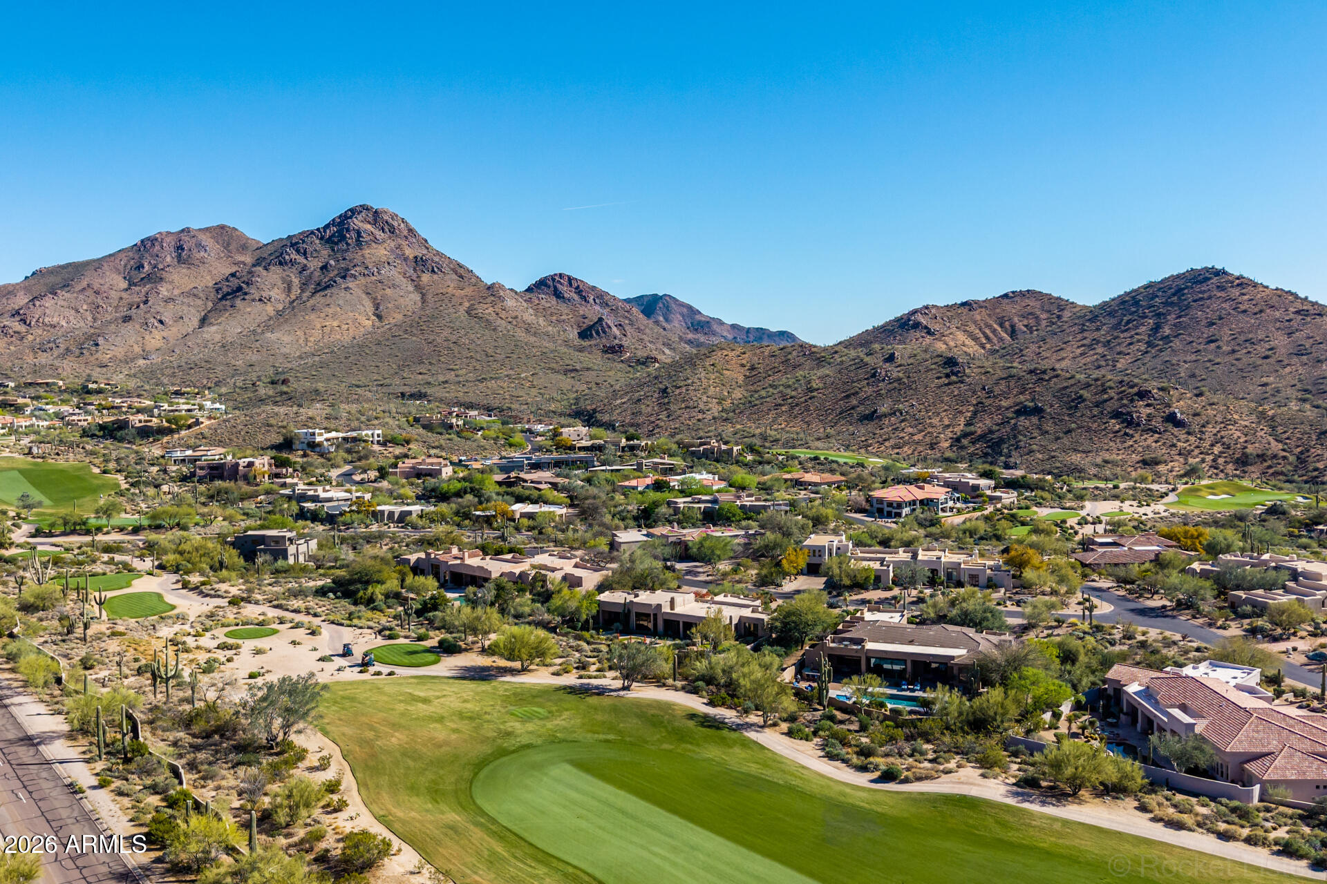 10801 East Happy Valley Road, Unit 24 Scottsdale, AZ 85255 - Photo 33 of 35 an aerial view of residential house and sandy dunes