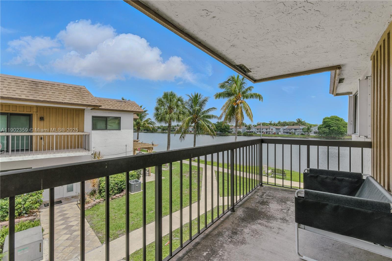6825 Northwest 169th Street, Unit 54H Hialeah, FL 33015 - Photo 27 of 46 a view of a building from a balcony