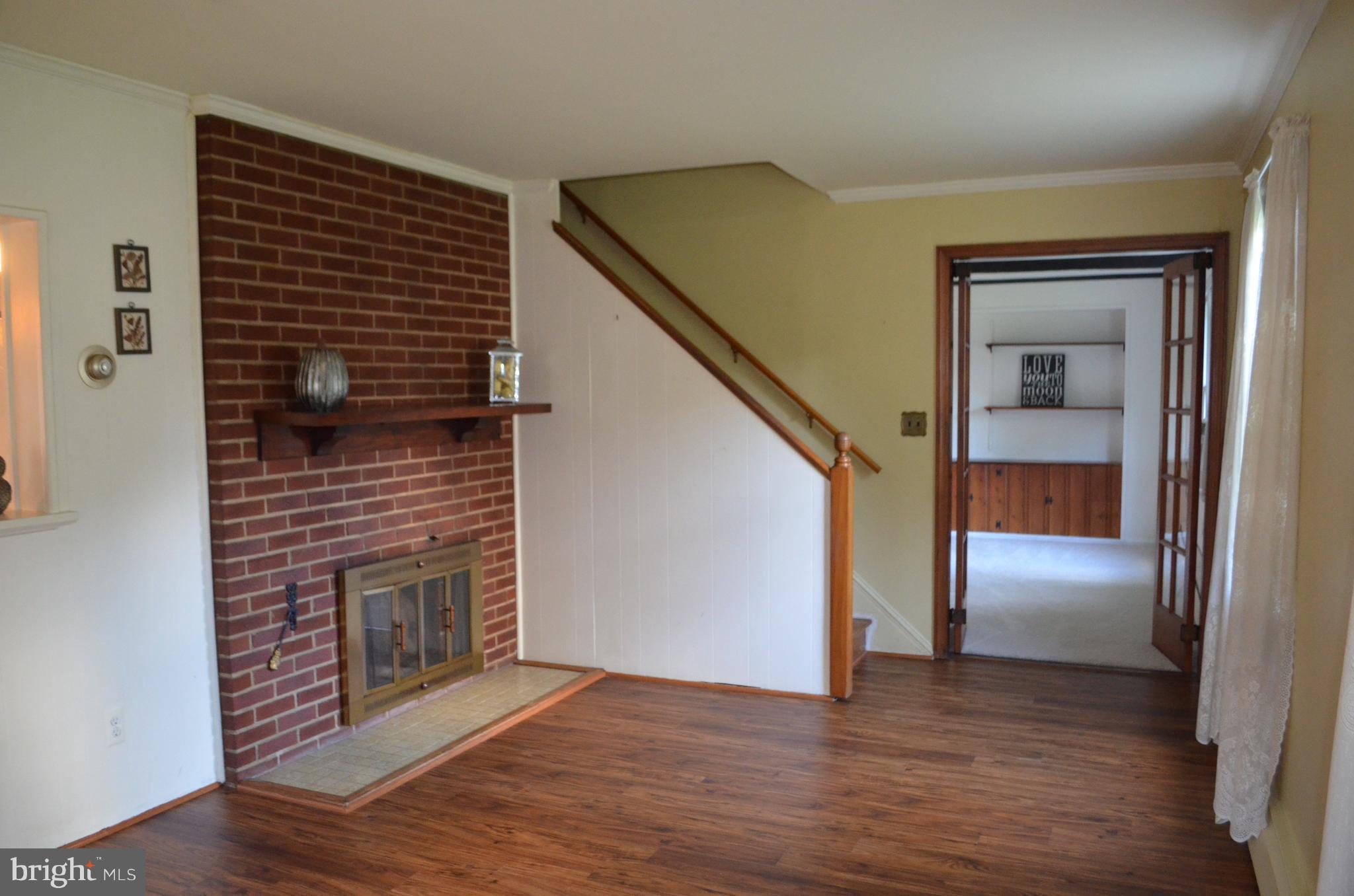 1322 Brook Road Baltimore, MD 21228 - Photo 3 of 23 Living Room opens to main level family room