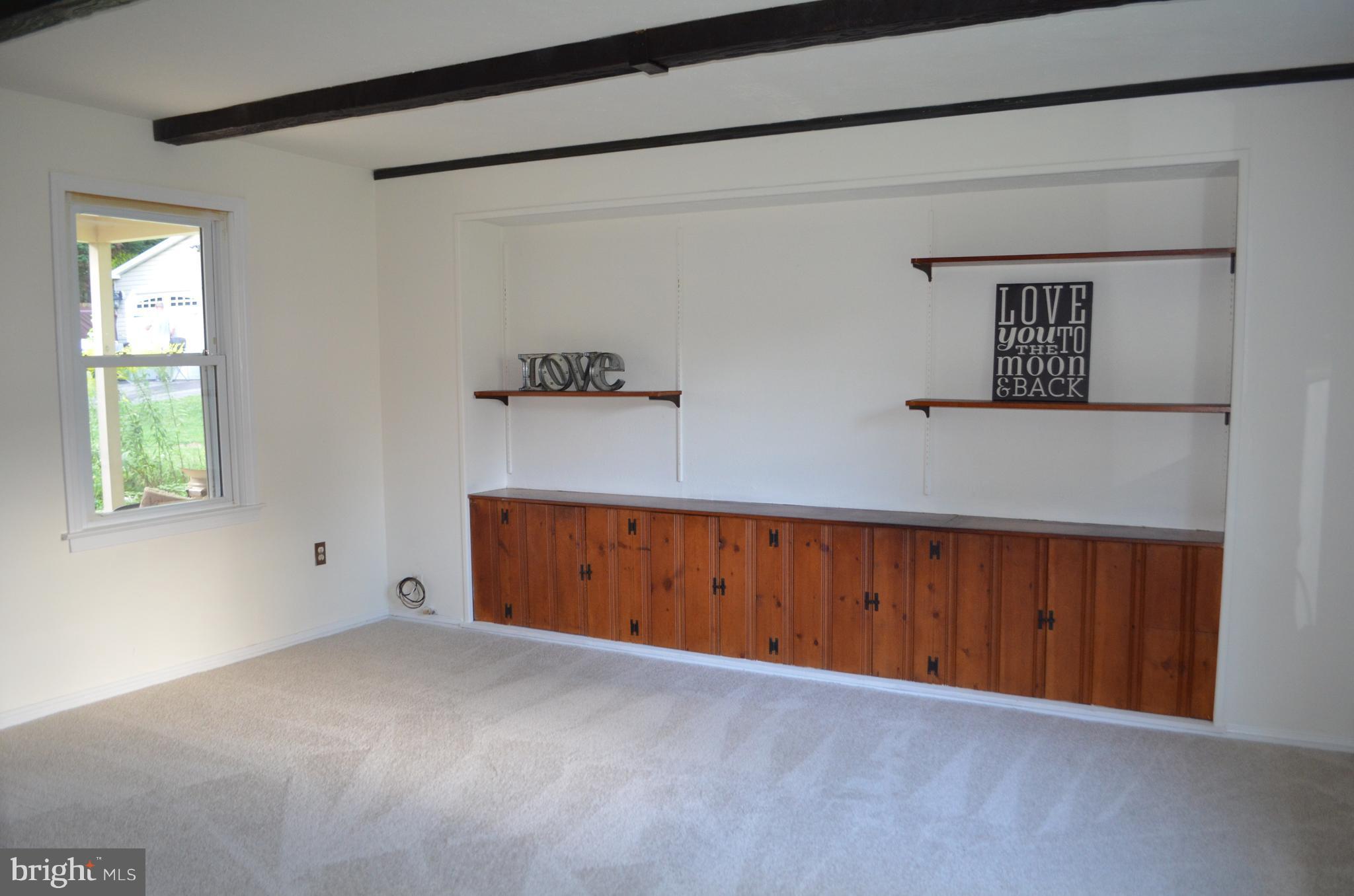 1322 Brook Road Baltimore, MD 21228 - Photo 8 of 23 Family Room has new carpet & lots of built ins