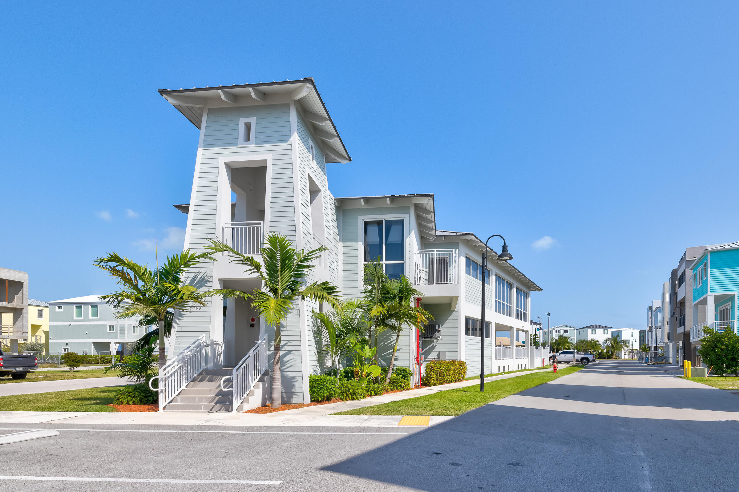 94825 Overseas Highway, Unit 68 Key Largo, FL 33037 - Photo 11 of 28 a front view of a house with garden