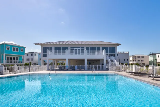 a view of a house with swimming pool