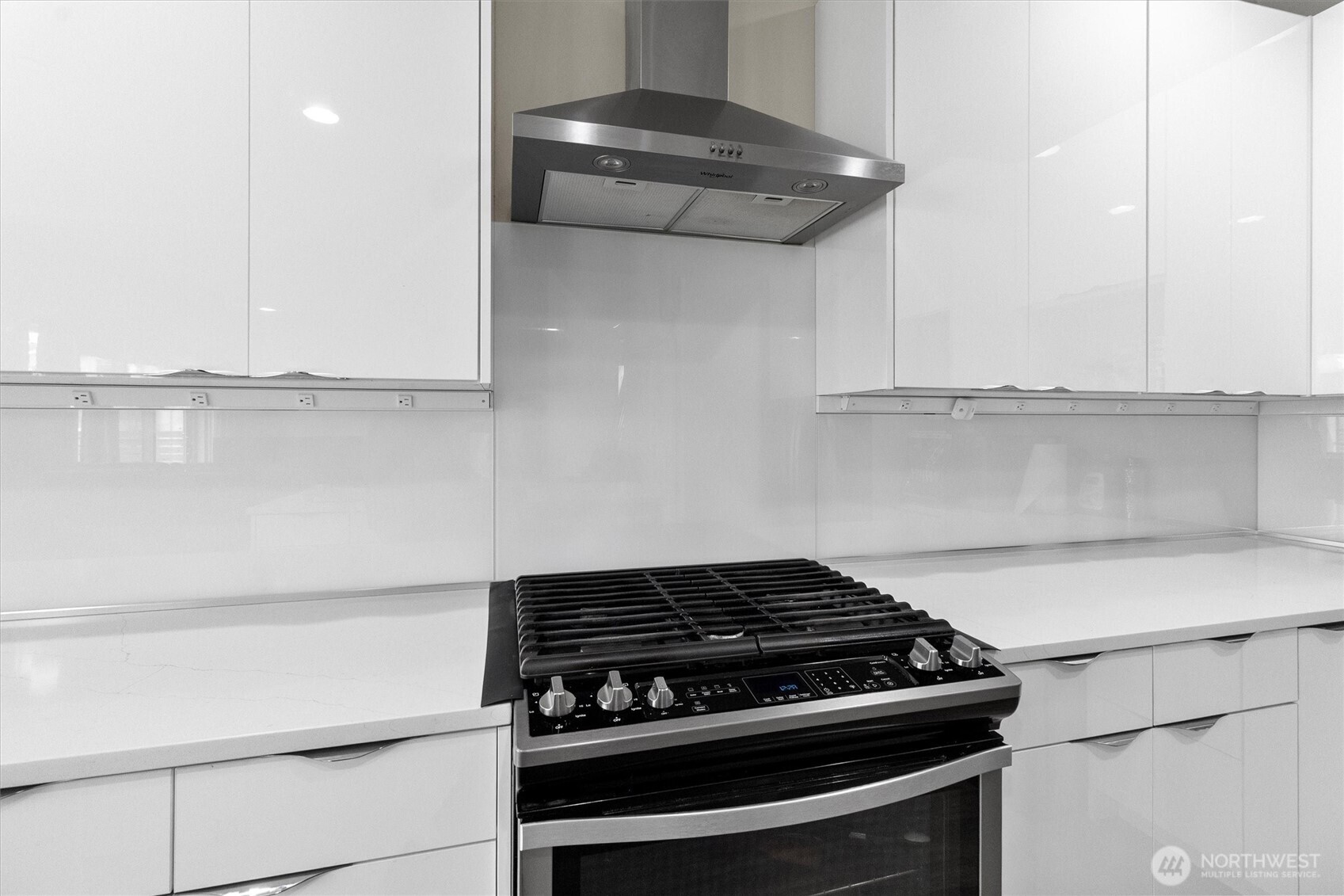 703 Northview Street Bellingham, WA 98226 - Photo 18 of 40 a stove top oven sitting inside of a kitchen