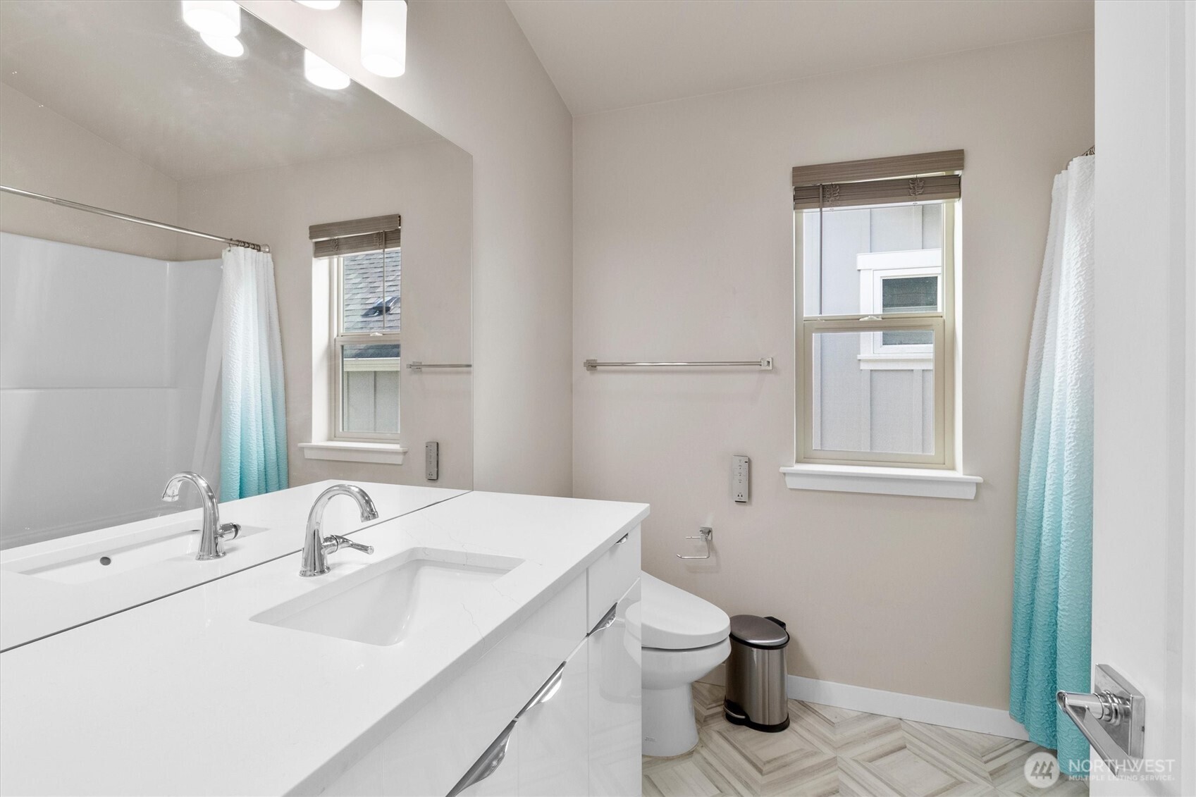 703 Northview Street Bellingham, WA 98226 - Photo 25 of 40 a bathroom with a sink toilet and mirror